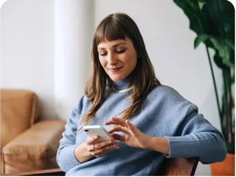 A woman completing the altRx assessment on her phone